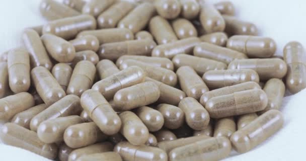 Capsules met placenta — Stockvideo