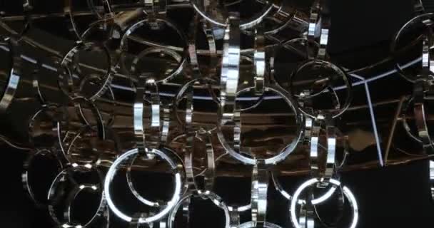 Metal chandelier of the rings — Stock Video