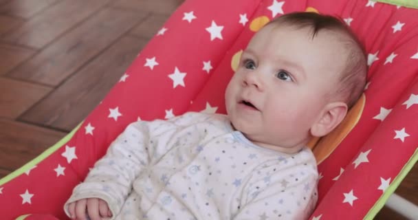 Baby is happy in the cradle — Stock Video