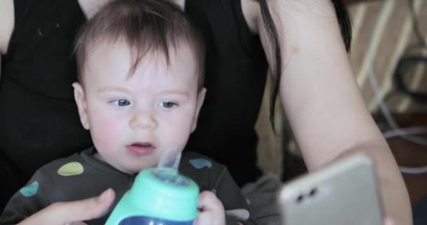 Baby boy drinking water — Stock Video
