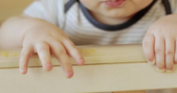 Baby boy in a crib — Stock Video