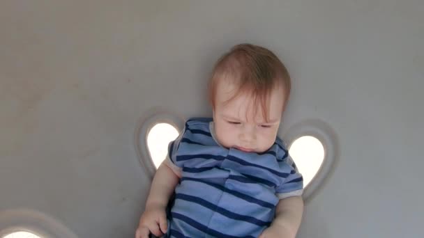 Baby boy on a swing — Stock Video