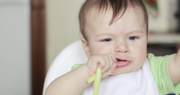 Baby boy eating a cucumber — Stock Video