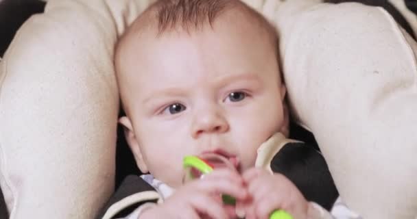 Baby boy in a rocking cradle — Stock Video