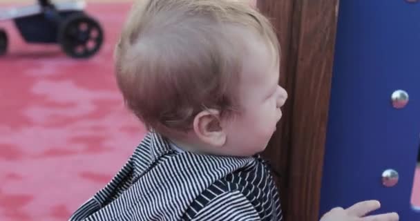 Baby boy in the playground — Stock Video