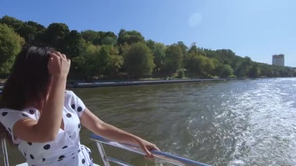 Girl at the stern on river — Stock Video