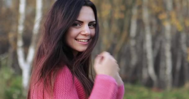 Girl in a red sweater — Stock Video