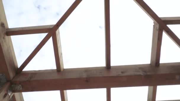 Wooden pergolas against a cloudy — Stock Footage Wooden pergolas against a cloudy Royalty Free Stock Footage