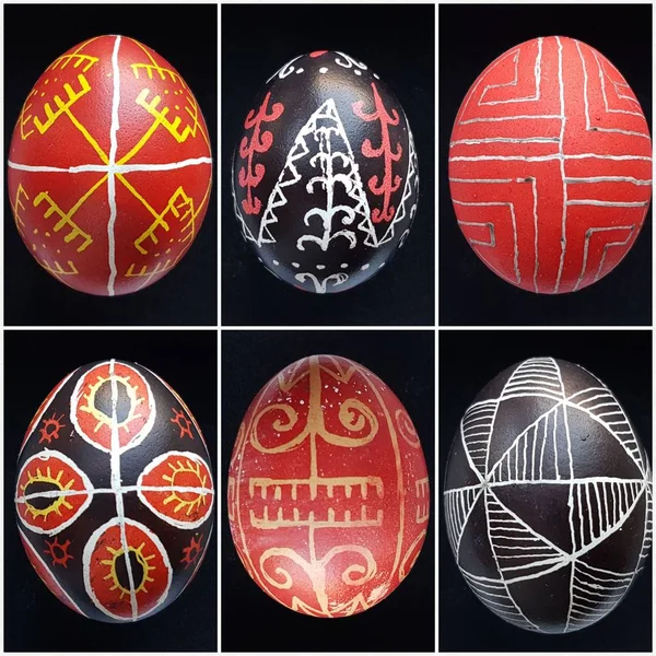 Ukrainian traditional art painted eggs pysanka isolated on black background six items