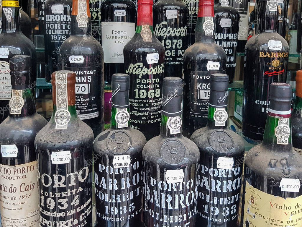 Lisbon, Portugal - 24.10.2016 - Shop Window with Old Porto Wine Bottles in Rua Augusta