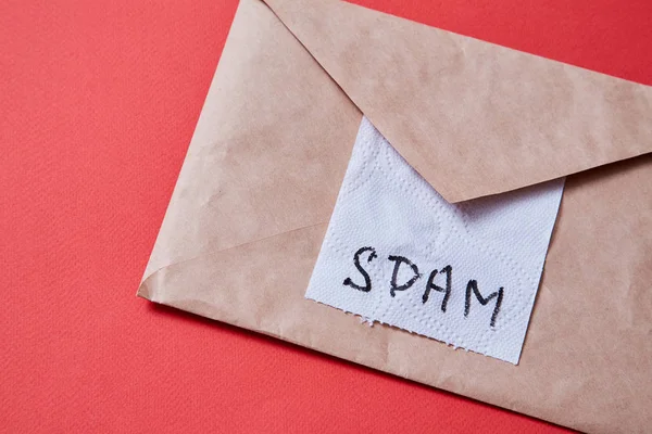 Junk mail or spam e-mail and unsolicited letter idea. Piece of toilet paper and envelope
