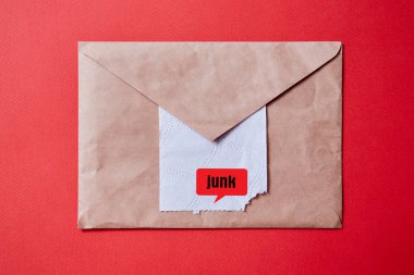 Junk mail or spam e-mail and unsolicited letter idea. Toilet paper sticking out of the envelope clipart