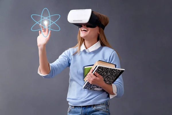 E-learning and online language school or web lesson. Webinar,and global internet courses. E-library. Girl in VR glasses