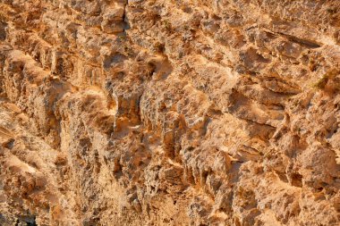 Bej renkli kireçtaşı dağ dokusu. Doğal taş materyali.