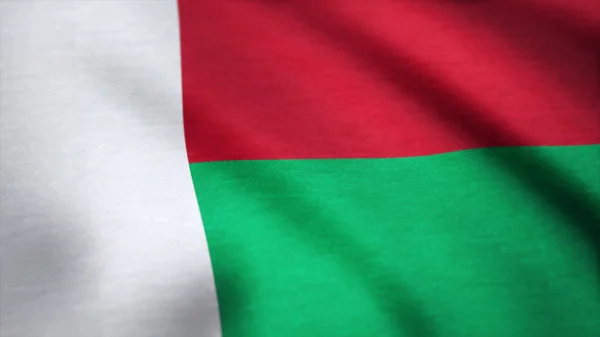 Madagaskar realistické mává vlajkou pozadí. Pozadí mávat ve větru vlajka Madagaskaru — Stock fotografie