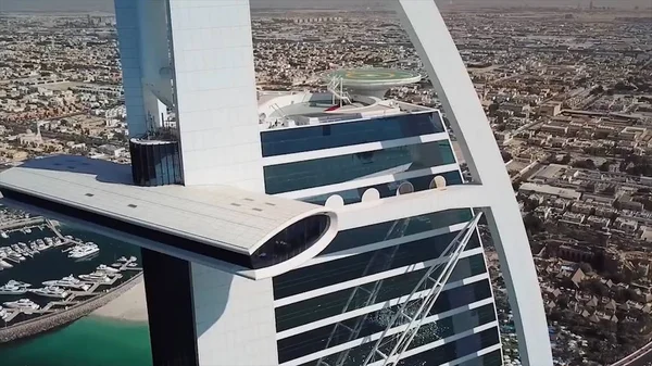 DUBAI, UAE - MAY 09, 2018: Aerial view of world most highly rated hotel Burj Al Arab. Stock. Burj Al Arab in Dubai, UAE. Burj Al Arab. Dubai coastline from the air. Aerial view — Stock Photo, Image