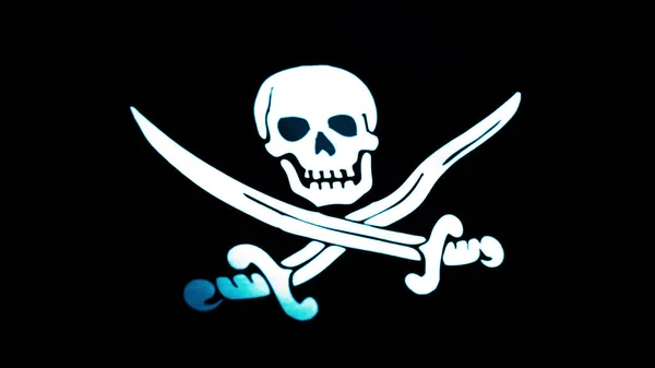 Animation of pirate flag closeup. Jolly Roger is traditional English name for flags flown to identify pirate ship about to attack. Pirate Flag Slow Motion Loop