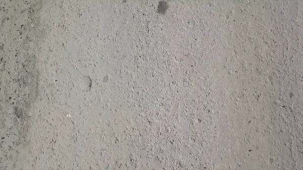 Texture of asphalt, seamless texture, pavement slide motion. Walking on cement floor background. Stock — Stock Photo, Image