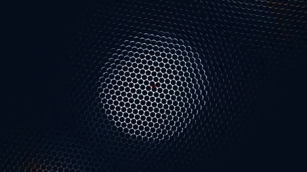 Ett metallnät med färgglada runda hål som en roterande bakgrund. Färgglada aluminium hål mönster textur. Färgglada metalliska grid rörelse bakgrunden. — Stockvideo