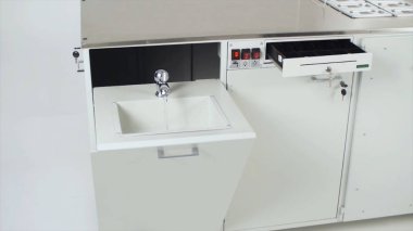 Modern mutfak iç elektrik ile. Küçük. Fütüristik mutfak takımı