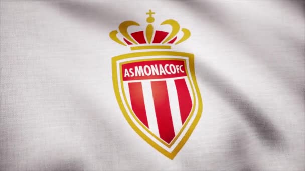 EUA - NOVA IORQUE, 12 de agosto de 2018: close-up da bandeira ondulada com o logotipo do clube de futebol do AS Monaco FC, loop sem costura. A bandeira do Monaco FC está acenando. Imagens editoriais — Vídeo de Stock
