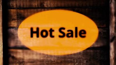 Sıcak Satılık Ahşap arka plan üzerinde duman ile metin yazma. Satış promosyon animasyon video