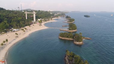 Singapur - Haziran, 2018: Palm Beach evleri üstten görünüm. Vurdu. En iyi görüş-in palmiye ağaçları ve lüks otel denize sıfır. Hava üstten görünüm manzara
