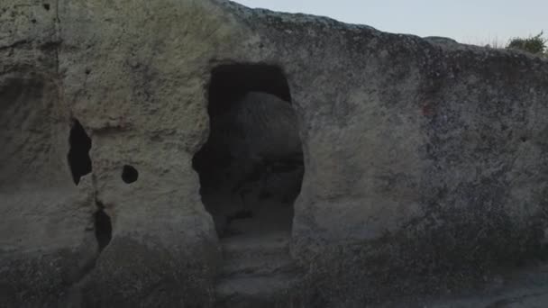 Open air museum, Cappadocia in a beautiful summer day. Aerial view on ancient settlement in rocks and caves. Shot — Stock Video