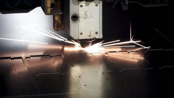 Cutting of metal. Sparks fly from laser. Clip. Laser cutting machine technology. Industrial Laser cutting processing manufacture technology of flat sheet metal steel material with sparks. Laser close — Stock Photo, Image