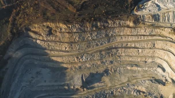 Top view of stepped quarry. Shot. Quarry working by method of open vertical benches. Mining industry concept — Stock Video