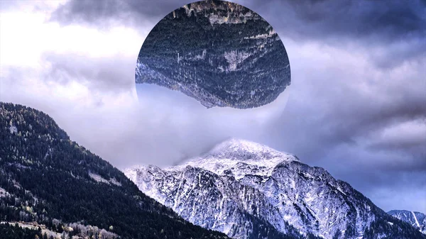 Abstract mountains covered with green forest and snow, big circle with the landscape reflection upside down. Mountainous landscape and a circle with mountains reflection, nature and geometry concept.