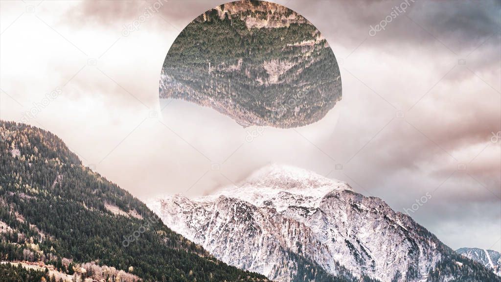 Abstract mountains covered with green forest and snow, big circle with the landscape reflection upside down. Mountainous landscape and a circle with mountains reflection, nature and geometry concept.