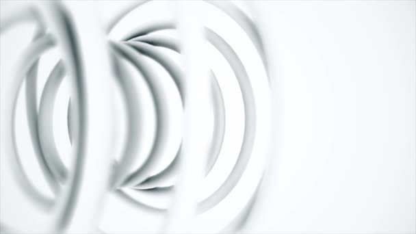 Close-up van abstracte kunststof voorjaar geïsoleerd op een witte achtergrond. Monochrom kunststof spoel, spiraal achtergrond. — Stockvideo
