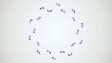 Soyut siyah boya ile bej renkli arka plan üzerinde ayakkabı izleri. Daire tek tek, üstten görünüm döner kaybolan ayak izleri.