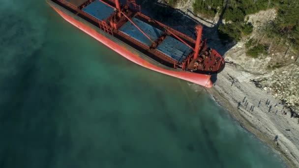 Famous abandoned wreck on the sea. Shot. Top view of an abandoned ship on the beach — Stock Video