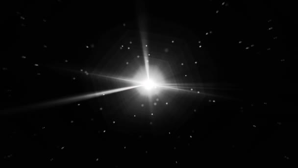 Rayons stellaires blancs abstraits tournant par intermittence avec de nombreuses petites particules sur fond noir, boucle transparente. Lumière vive et petits points filant sans fin, monochrome . — Video