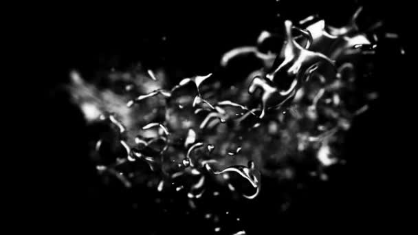 Chiudere per filatura spruzzi d'acqua su uno sfondo nero, anello senza soluzione di continuità. Esplosione liquida rotante monocromatica . — Video Stock