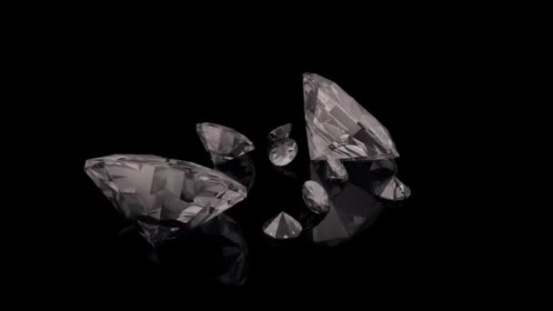 Animación abstracta de la caída y rotación de diamantes grandes y pequeños en cámara lenta sobre un fondo negro. animación 3d . — Vídeo de stock