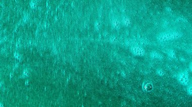 Hareketli renkli sıvı arka plan. Parlak yaşam sıvı boya, yüzey ve parıldayan parlak alt köpüren ile