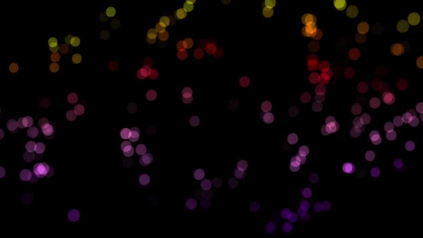 Schitterende kleurrijke cirkels, glanzende deeltjes glinsterende op zwarte achtergrond. Vervagen van kleine puntjes knippert, naadloze loops. — Stockvideo