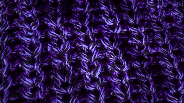 Textura de lana, primer plano de patrón textil drapeado. Fondo de tela de textura de lana. Detalles visibles en hilos delicados, que componen la tela tejida — Vídeos de Stock