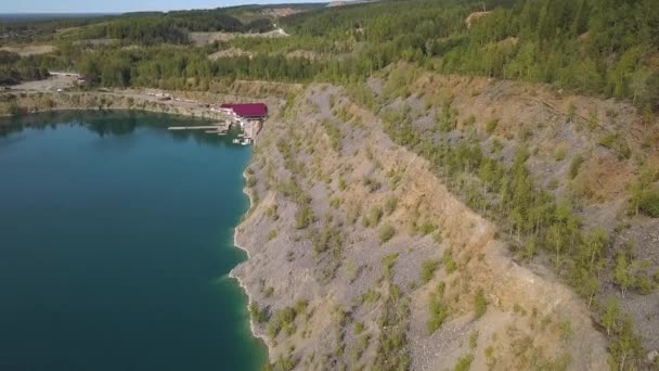 Beautiful mountain pond aerial view. Clip. Pond in the stone quarry — Stock Video