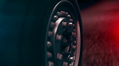 Close-Up hareketli araba tekerleği ile kırmızı ve Mavi ışıklar bulanıklık. Otomobil ve yol.