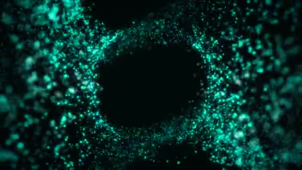 Animation abstraite de petites particules turquoises se déplaçant en cercle sur un fond noir. Belles étincelles volantes . — Video