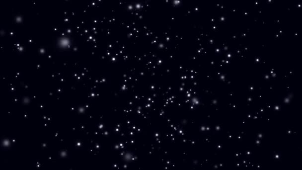 Abstract background with rotating bokeh space on black background. Animation. Space with moving colored shining particles on black background. Like cosmic starry space — Stock Video