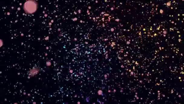 Fundo abstrato com espaço bokeh rotativo sobre fundo preto. Animação. Espaço com partículas brilhantes coloridas em movimento no fundo preto. Como o espaço cósmico estrelado — Vídeo de Stock