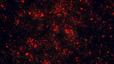 Parlak kırmızı parçacıkların siyah bir arka plan üzerinde hareket soyut animasyon. Görüntü. Renkli animasyon