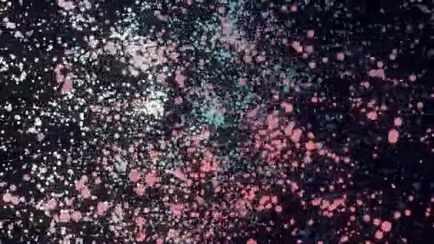 Astrazione di particelle colorate rotazione su uno sfondo nero. Un filmato. Animazione colorata — Video Stock