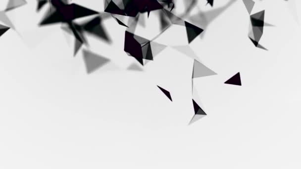 Abstrakt svart moln av trianglar som flyter på vit bakgrund, svartvitt. Lager. Magnetizing rörelse av geometriska siffror. — Stockvideo