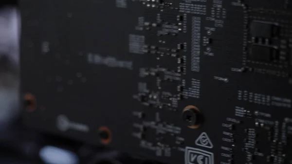 Bitcoin cryptocurrency mining farm with a close up view of the detail of a mechanism with blinking indicator. Stock footage. Part of a mining farm system.